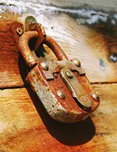 Rusted Lock on old wooden chest