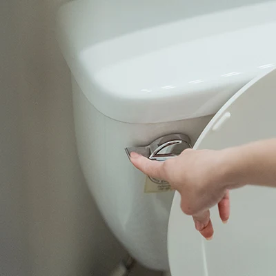 Toilet being flushed